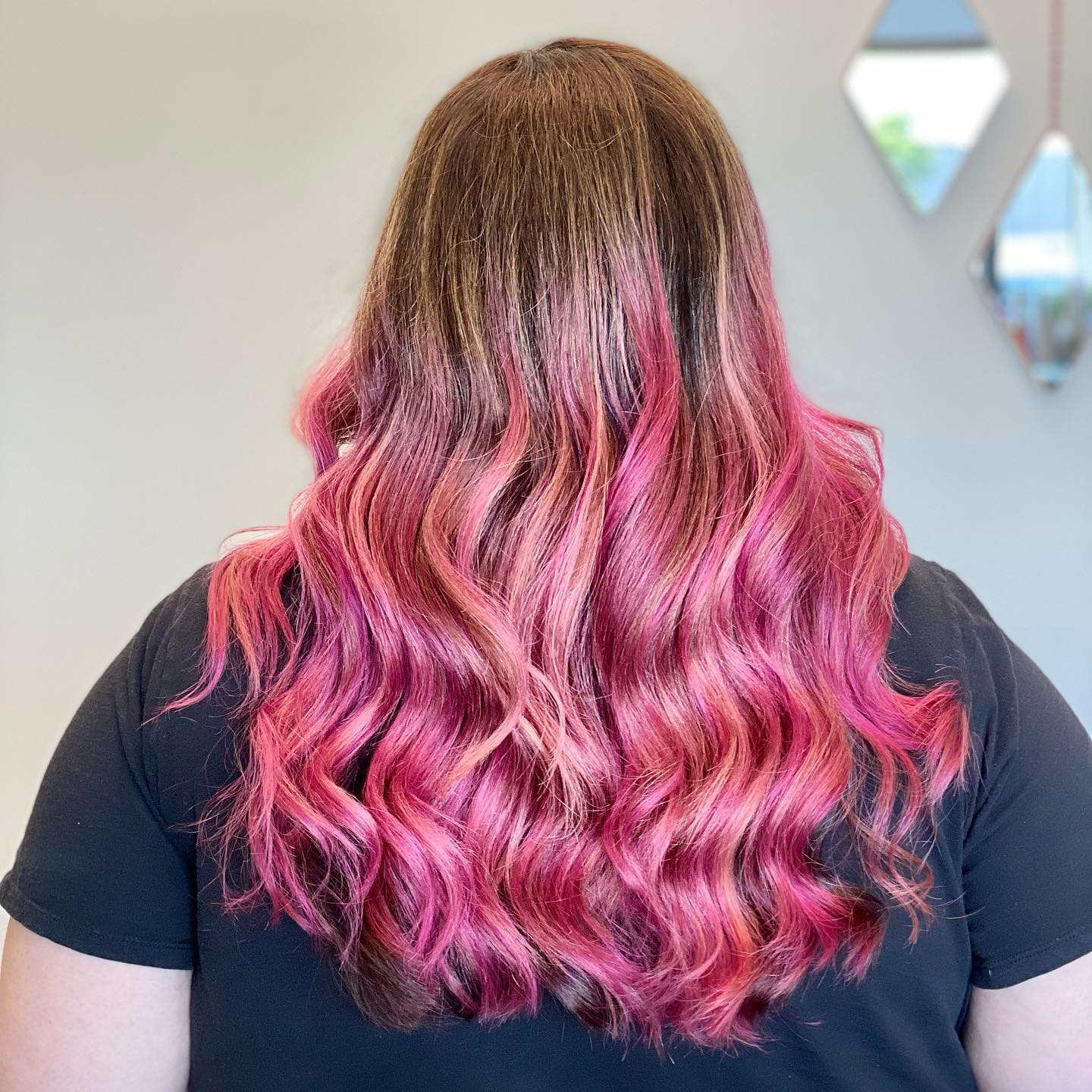 Vivid magenta waves blended into a brunette base.