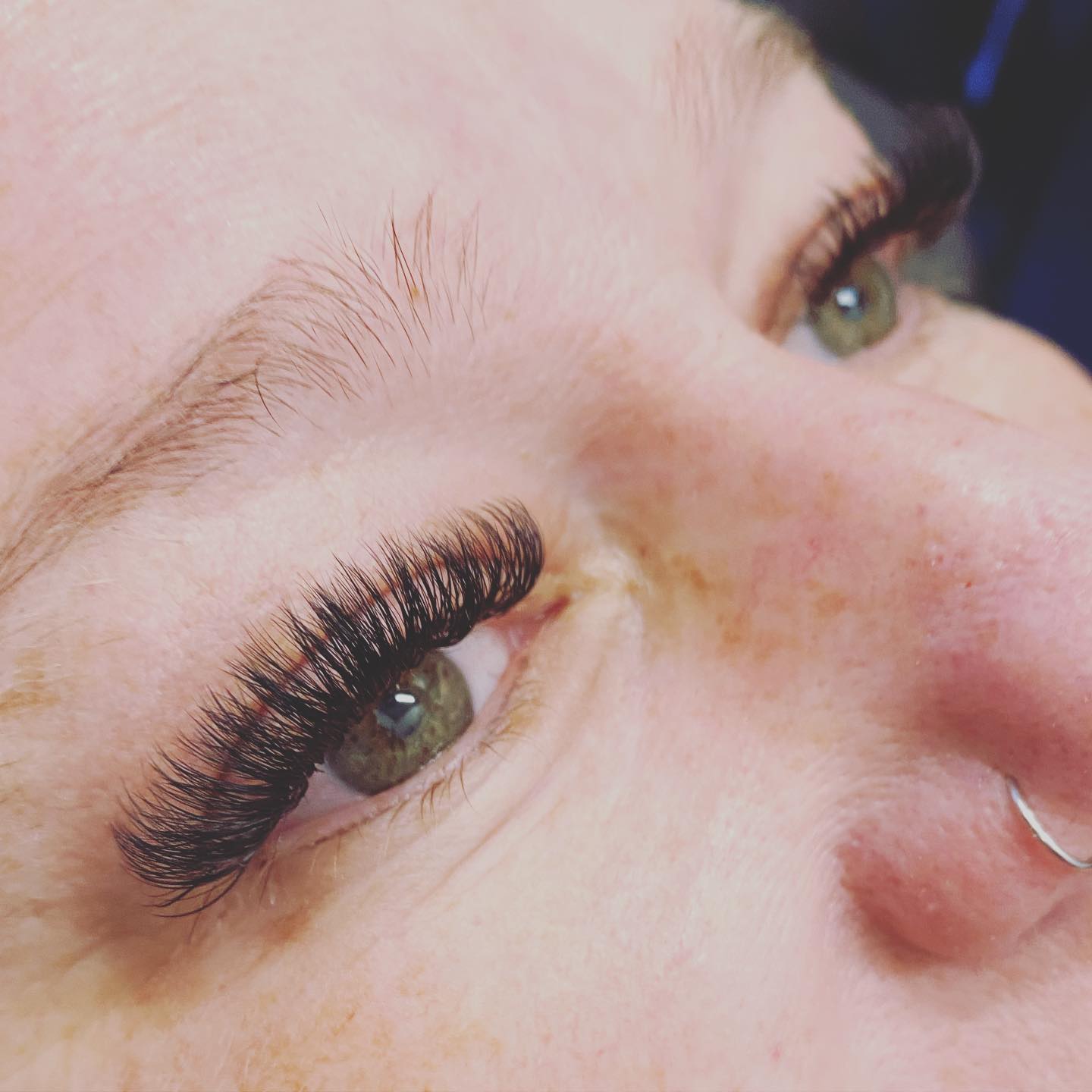 Close-up of a soft, even dark lash line.